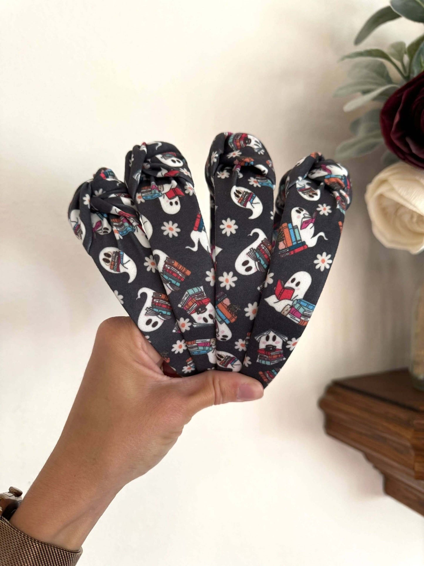 Halloween Book Nerd Ghosts Topknot Headband, Get ready for Halloween with these cutie ghosts - book in hand and ready for some fun. Fit: These headbands fit sizing 2 years up to 99 years +. The base is bendable and can bend to any head size! You'll notice