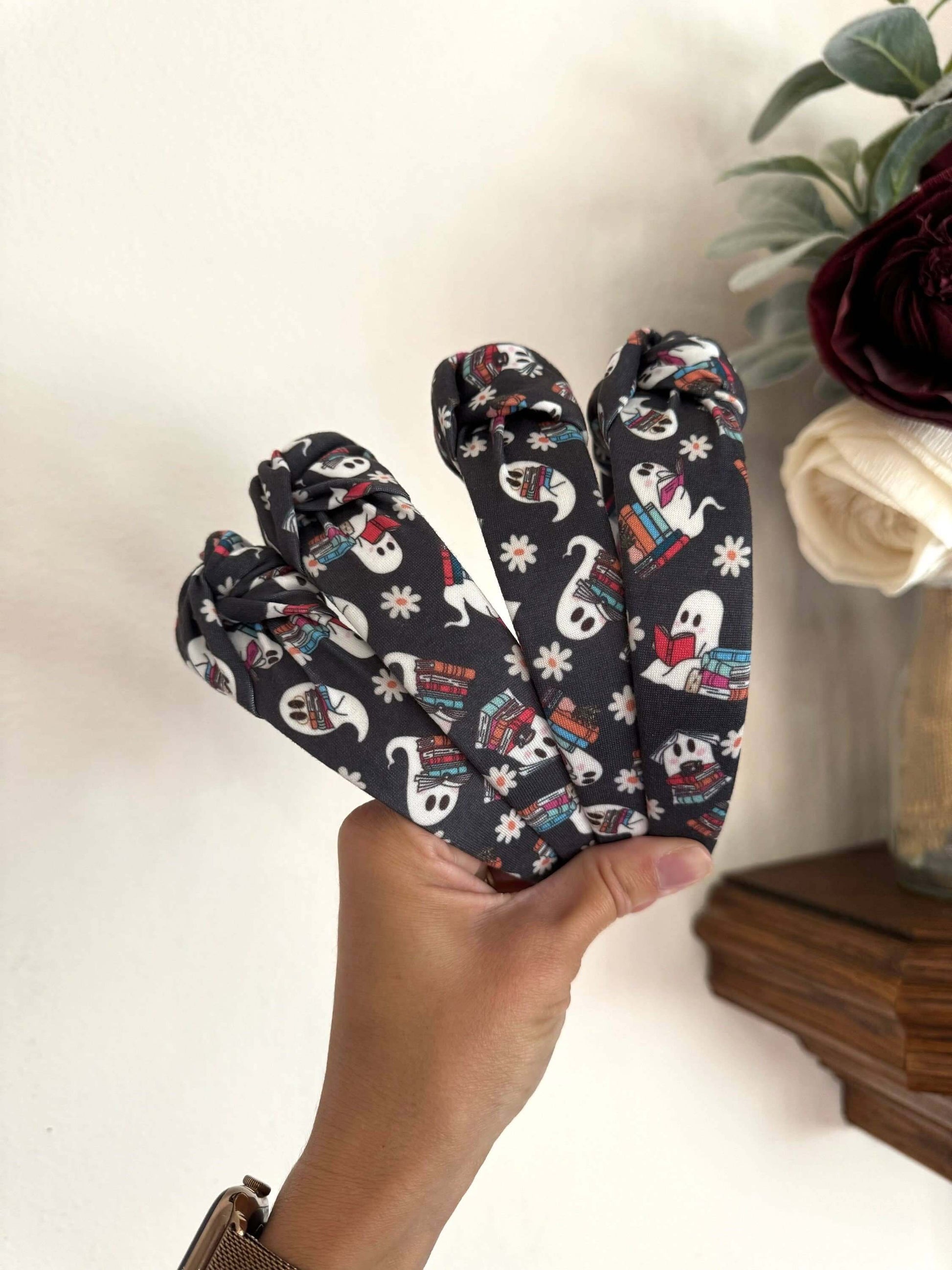 Halloween Book Nerd Ghosts Topknot Headband, Get ready for Halloween with these cutie ghosts - book in hand and ready for some fun. Fit: These headbands fit sizing 2 years up to 99 years +. The base is bendable and can bend to any head size! You'll notice