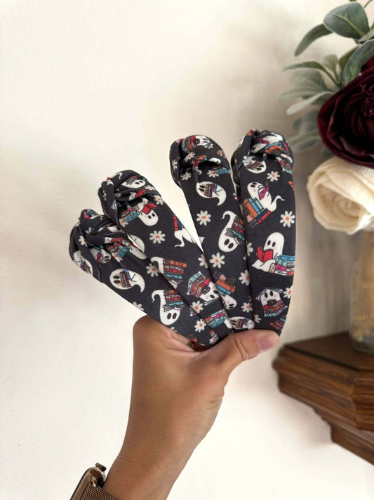 Halloween Book Nerd Ghosts Topknot Headband, Get ready for Halloween with these cutie ghosts - book in hand and ready for some fun. Fit: These headbands fit sizing 2 years up to 99 years +. The base is bendable and can bend to any head size! You'll notice